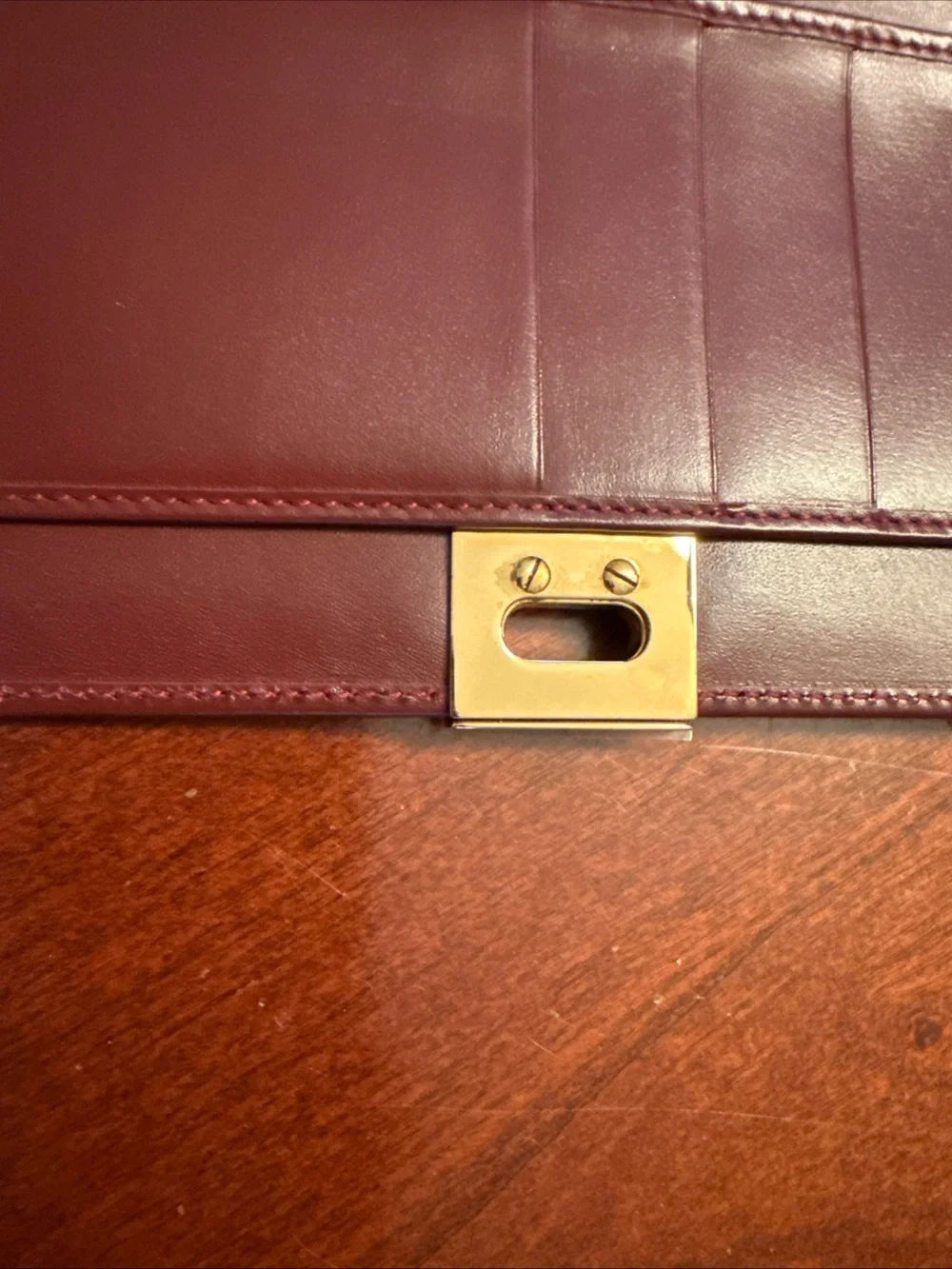 Salvatore Ferragamo Burgundy Leather Wallet with Gold Hardware